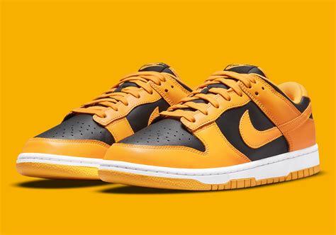 yellow black nike dunks|nike dunk low goldenrod 2021.